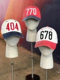 Area code baseball hats (from left to right): White with Navy bill and Red felt, Red with Navy bill and White felt, White with Red bill and Black letters