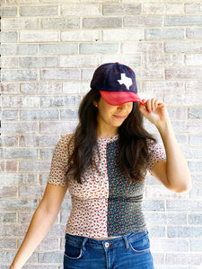 Texas State Shape baseball hat. Hat color: Navy with Red bill and White felt