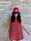 Red hat with Navy bill and White ITP (inside the perimeter) letters