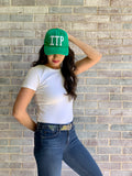 Faded Green hat with white felt ITP (inside the perimeter) letters